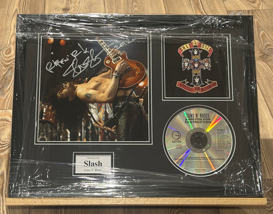 Slash signed and framed picture